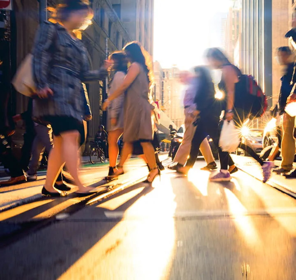 Women walking across a street