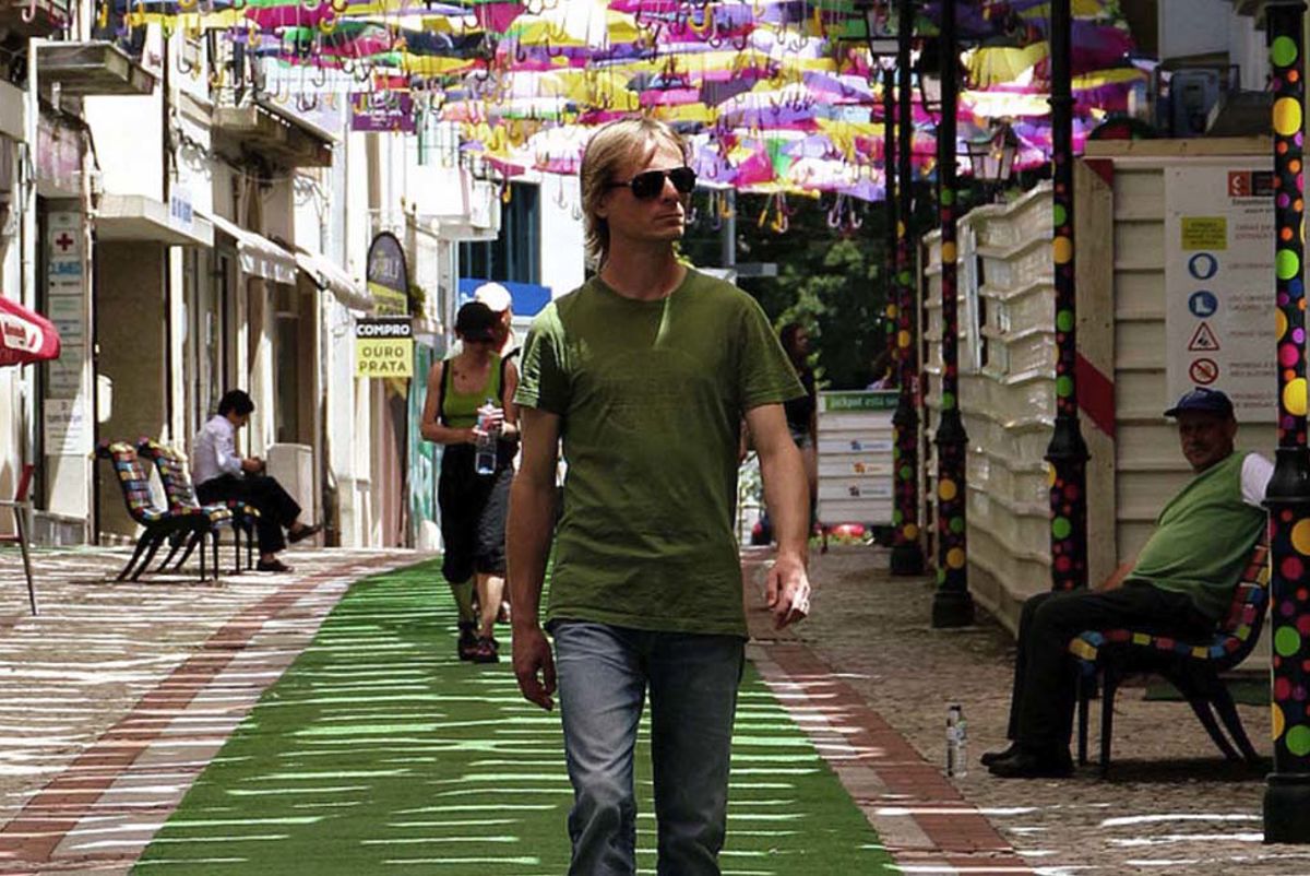 Man walking along a city street