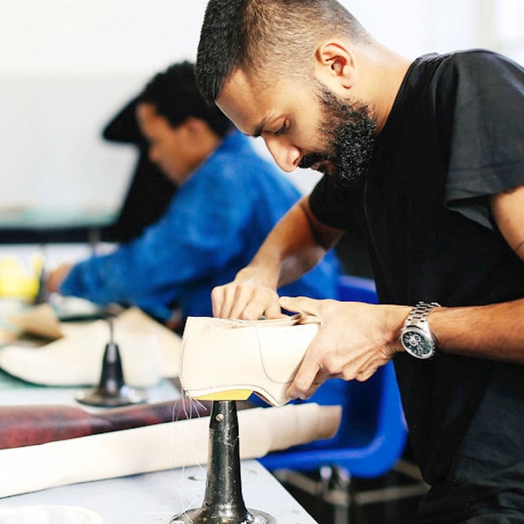 People working in a workshop near the Olympic Park