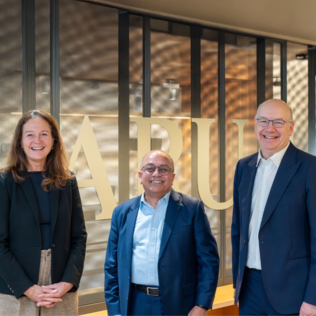 Hilde Tonne, Mahadev Raman and Jerome Frost OBE standing together