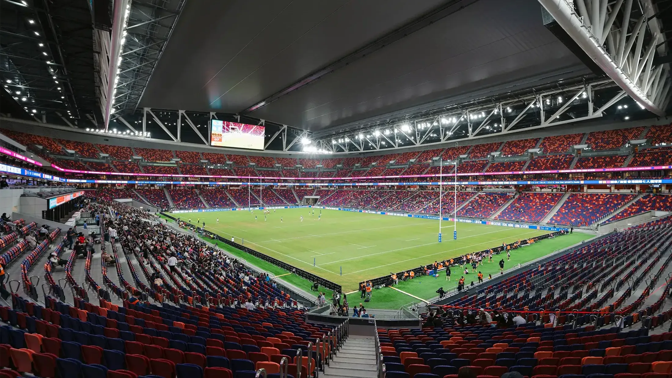 Interior view of the Kai Tak Stadium, showcasing its impressive 50,000-seat capacity and state-of-the-art design, providing a superior experience for spectators