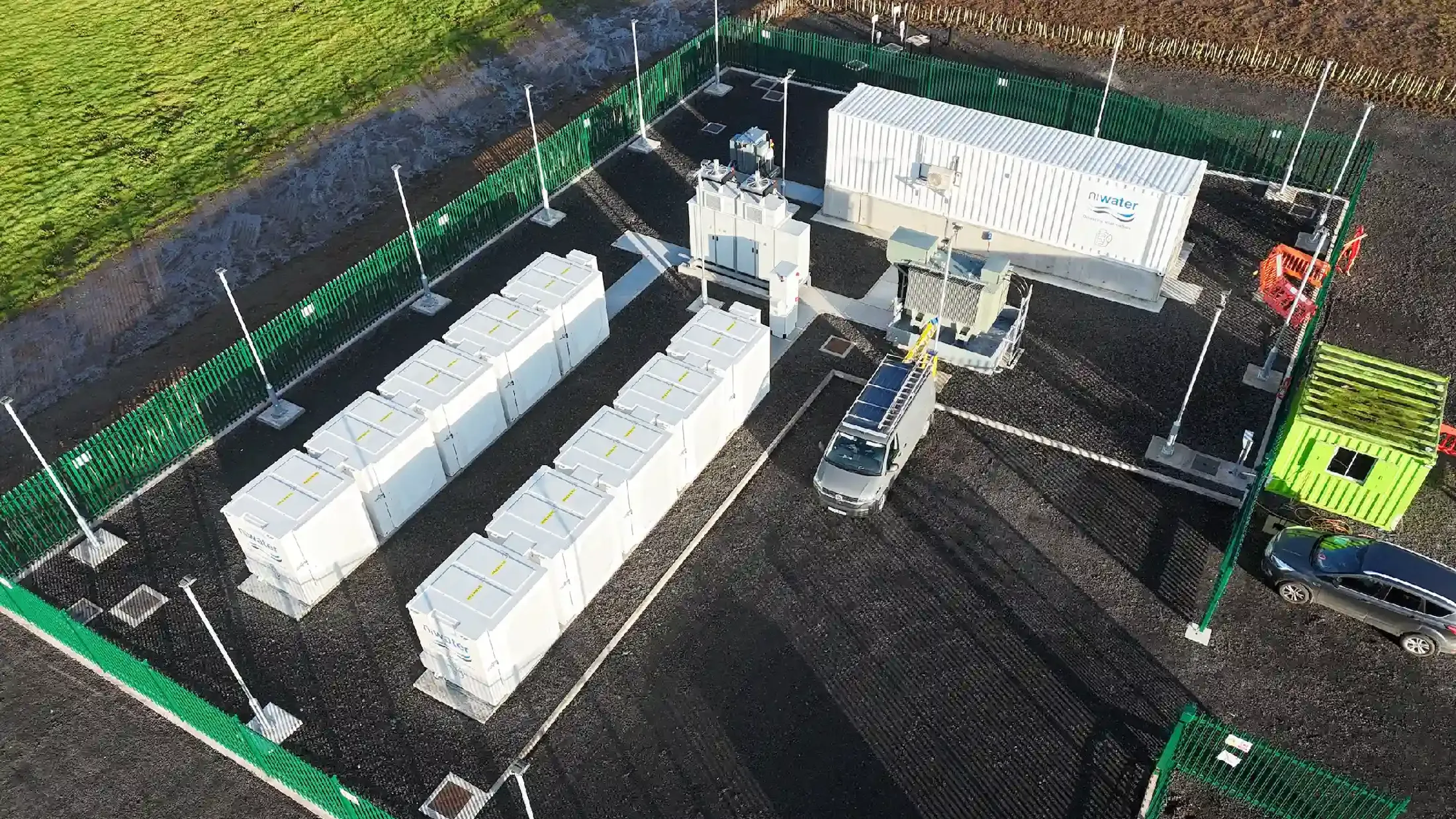 Construction site with large white containers.