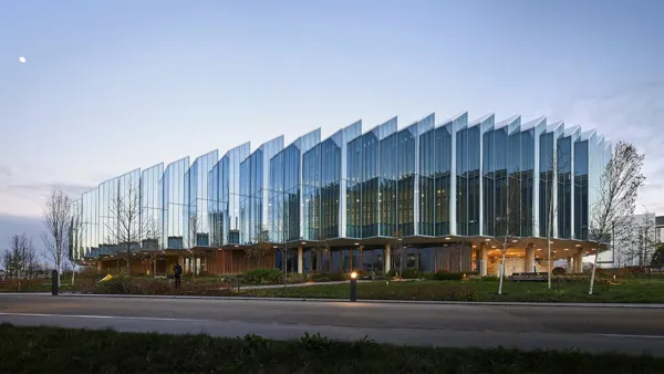 A large building with glass walls.